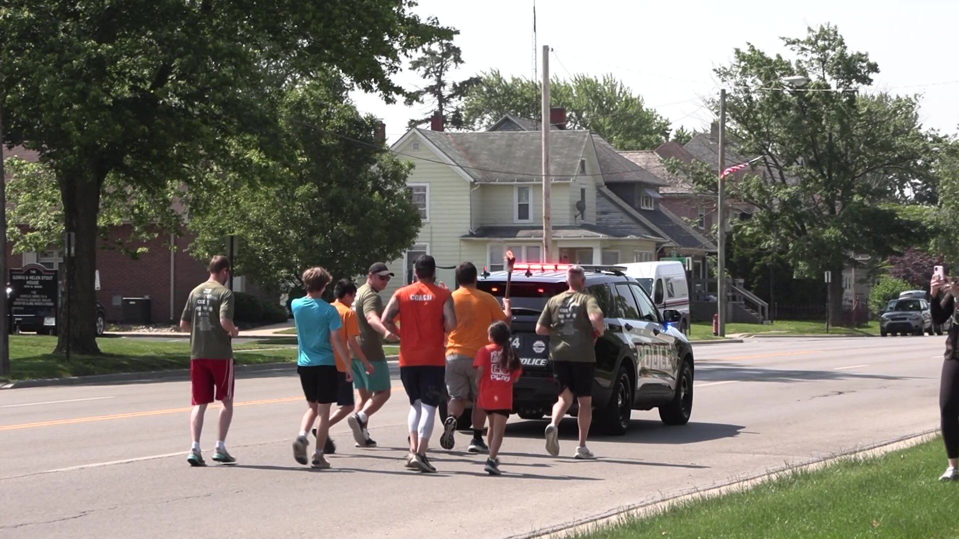 ‘Flame of Hope’ passes through Findlay for Special Olympics Torch Run